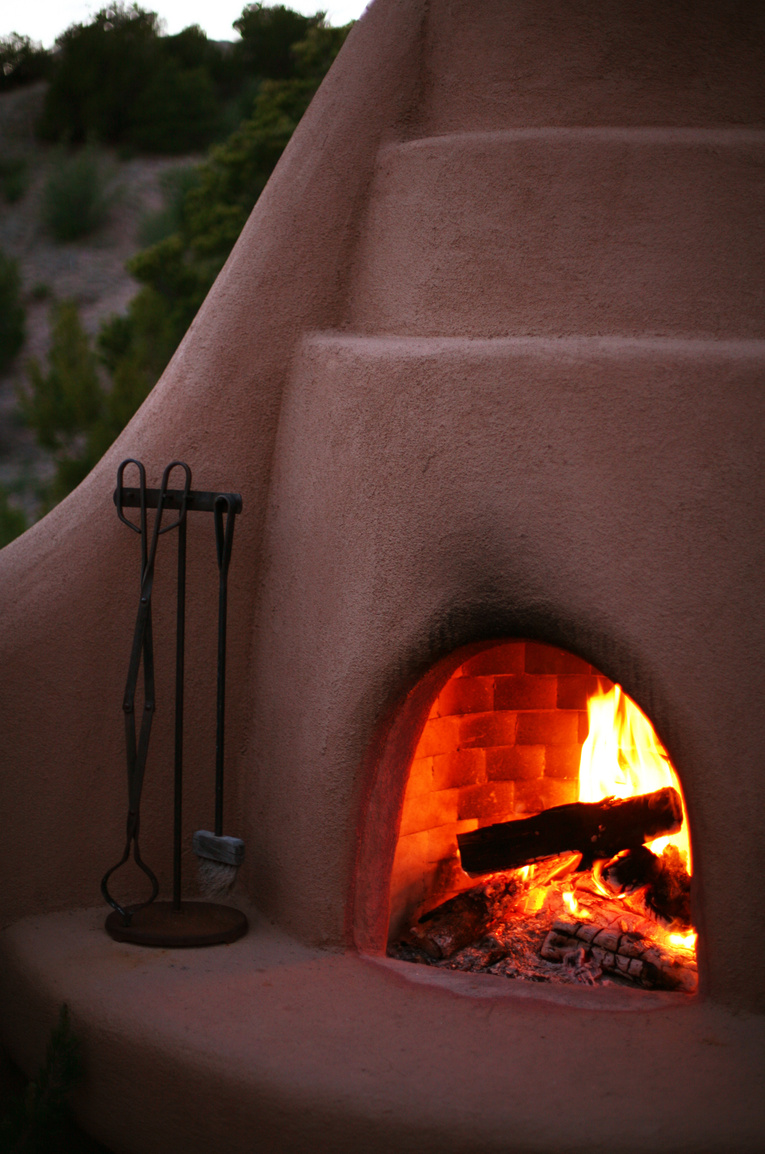 Kiva Fireplace Adobe with Burning Embers